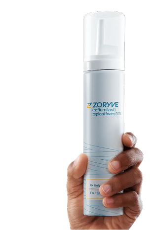 Hand holding ZORYVE (roflumilast) topical foam 0.3%